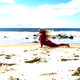 Illustration for article titled Elsewhere, Britney Spears is Doing Beach Yoga
